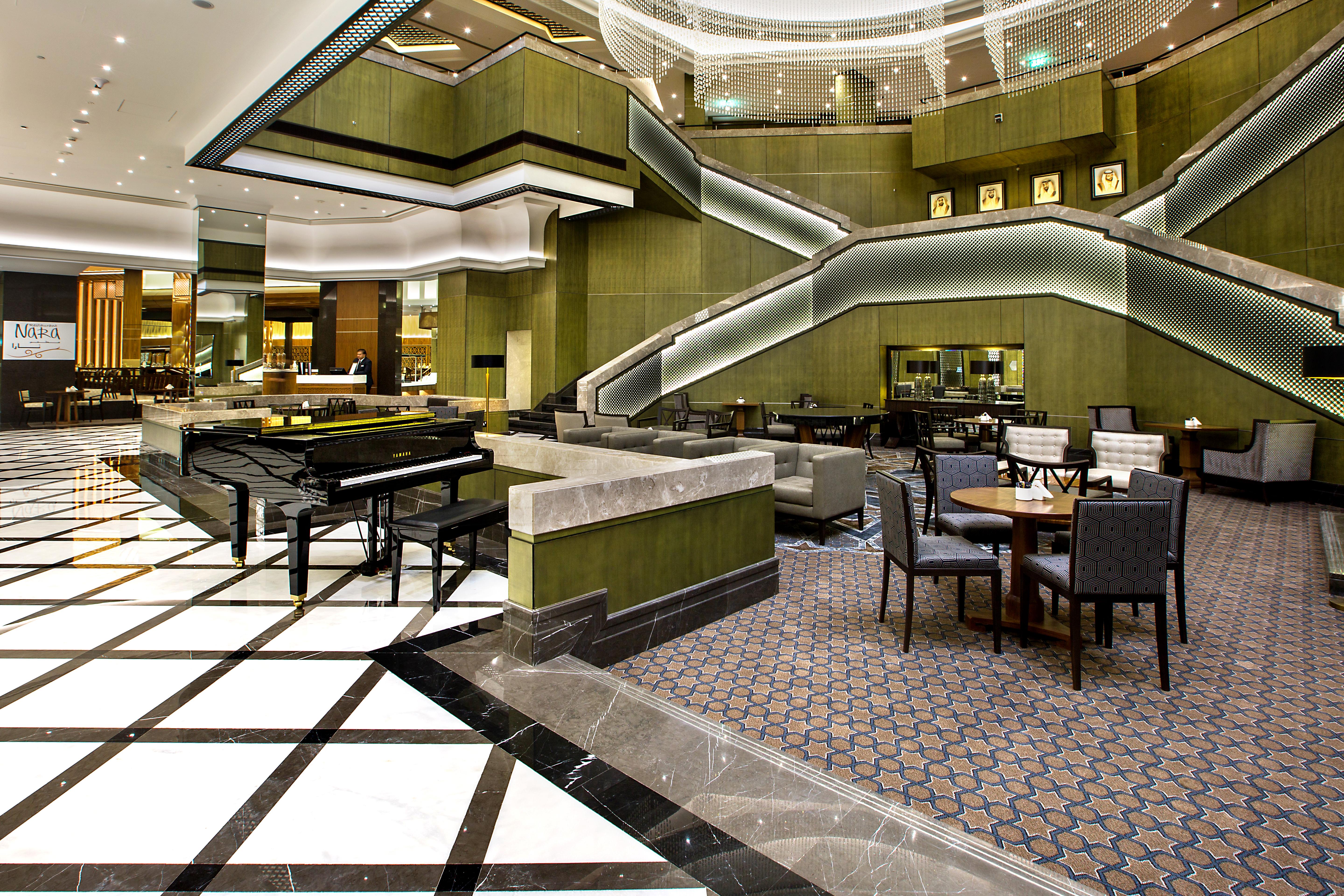 艾拉格兰德酒店 艾因 外观 照片 The lobby of the hotel